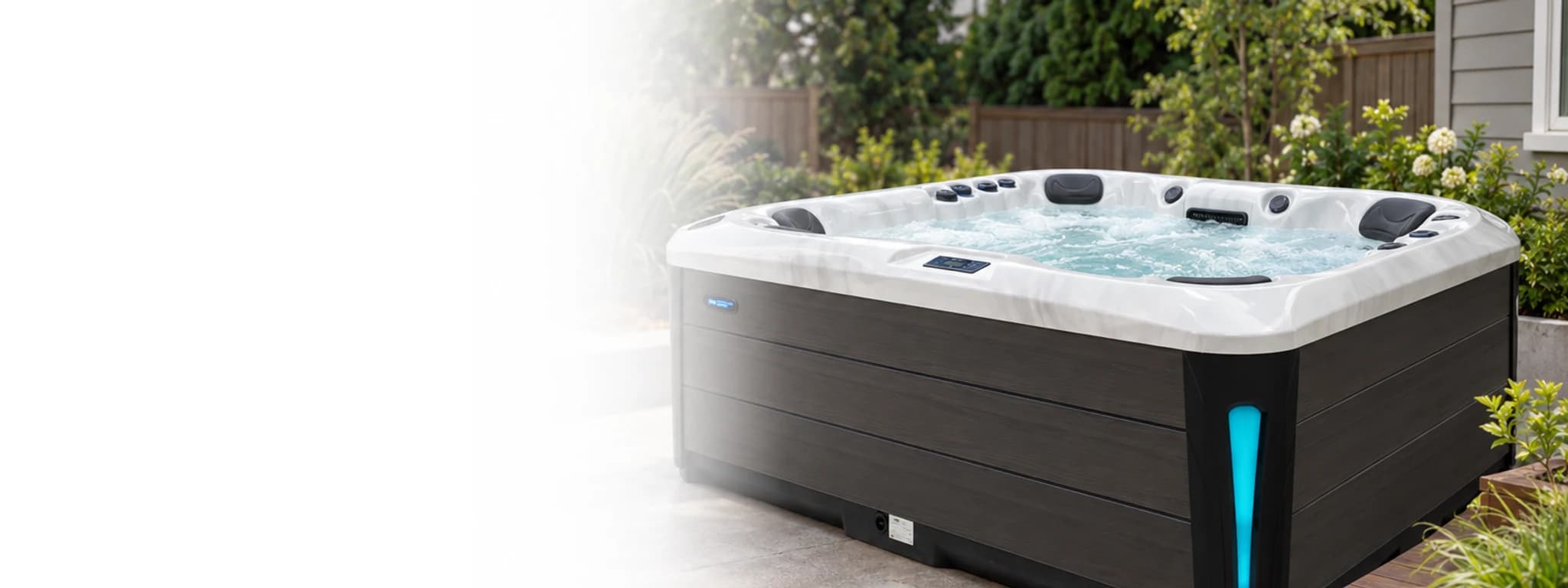 Platinum Spas Oslo hot tub, filled, on a Tacoma patio