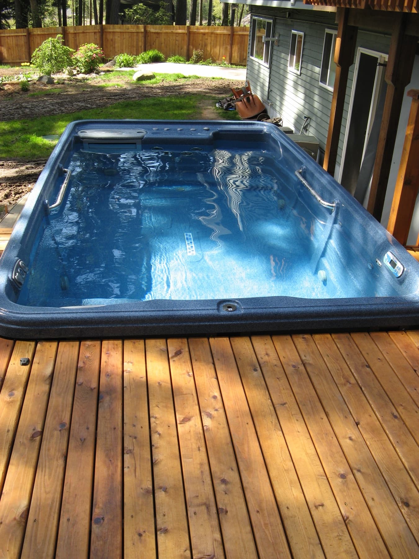 Swim spa set into a cedar deck