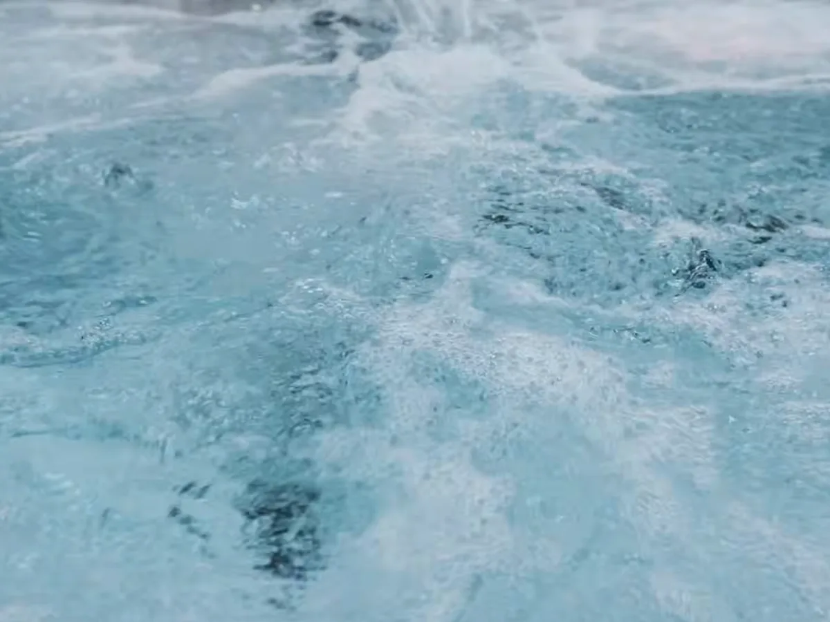 Clear hot tub water churning from the jets